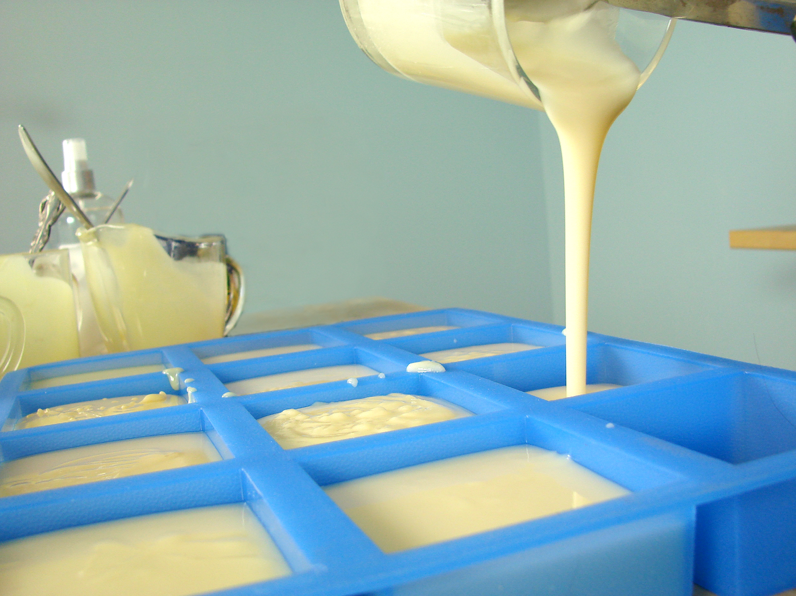 Pouring prepared soap recipe in the soap mould